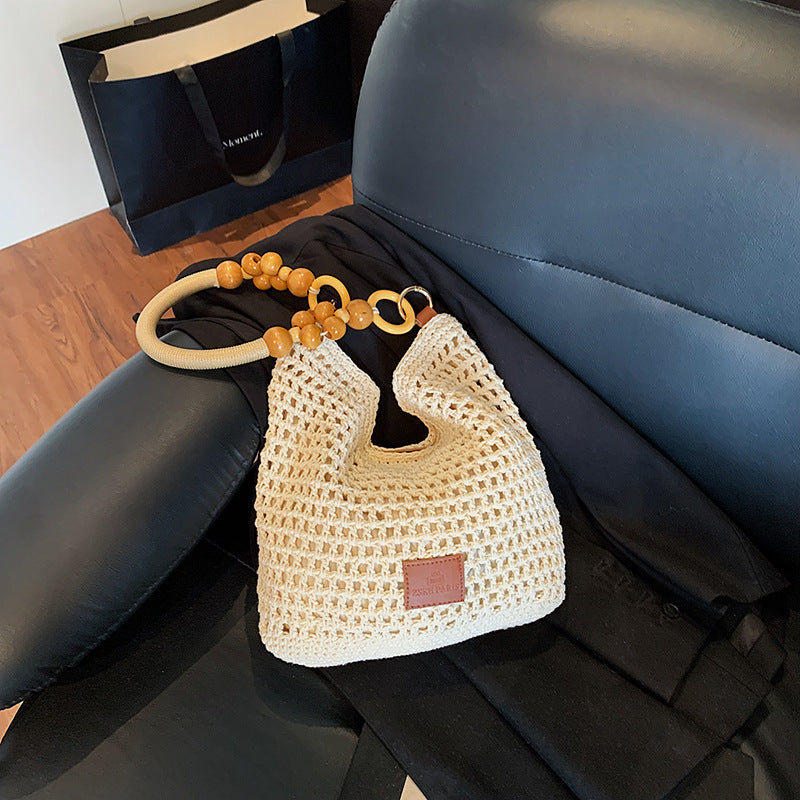 Casual large-capacity cotton thread woven bag New hollow hand-woven shoulder bag Vacation beach bag Versatile women's bag
