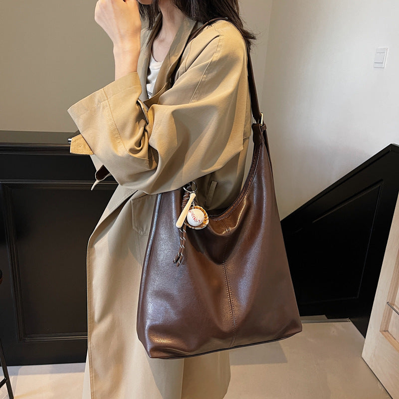 Casual commuting retro large-capacity bag women's 2025 new winter and winter shoulder bag college students class tote bag