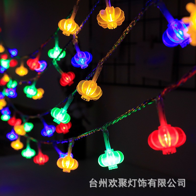LED lantern string, Chinese New Year lanterns, Spring Festival flashing lights, festive Lantern Festival, New Year's fringed red lanterns