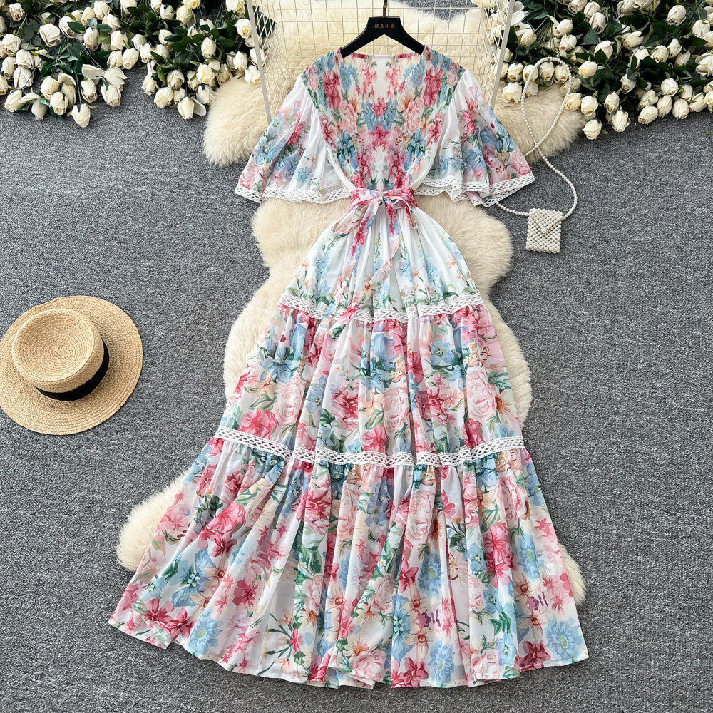 French riviera style printed short-sleeve pleated dress - women's summer v-neck, cinched waist, tie-up maxi dress - high-end, slimming fit