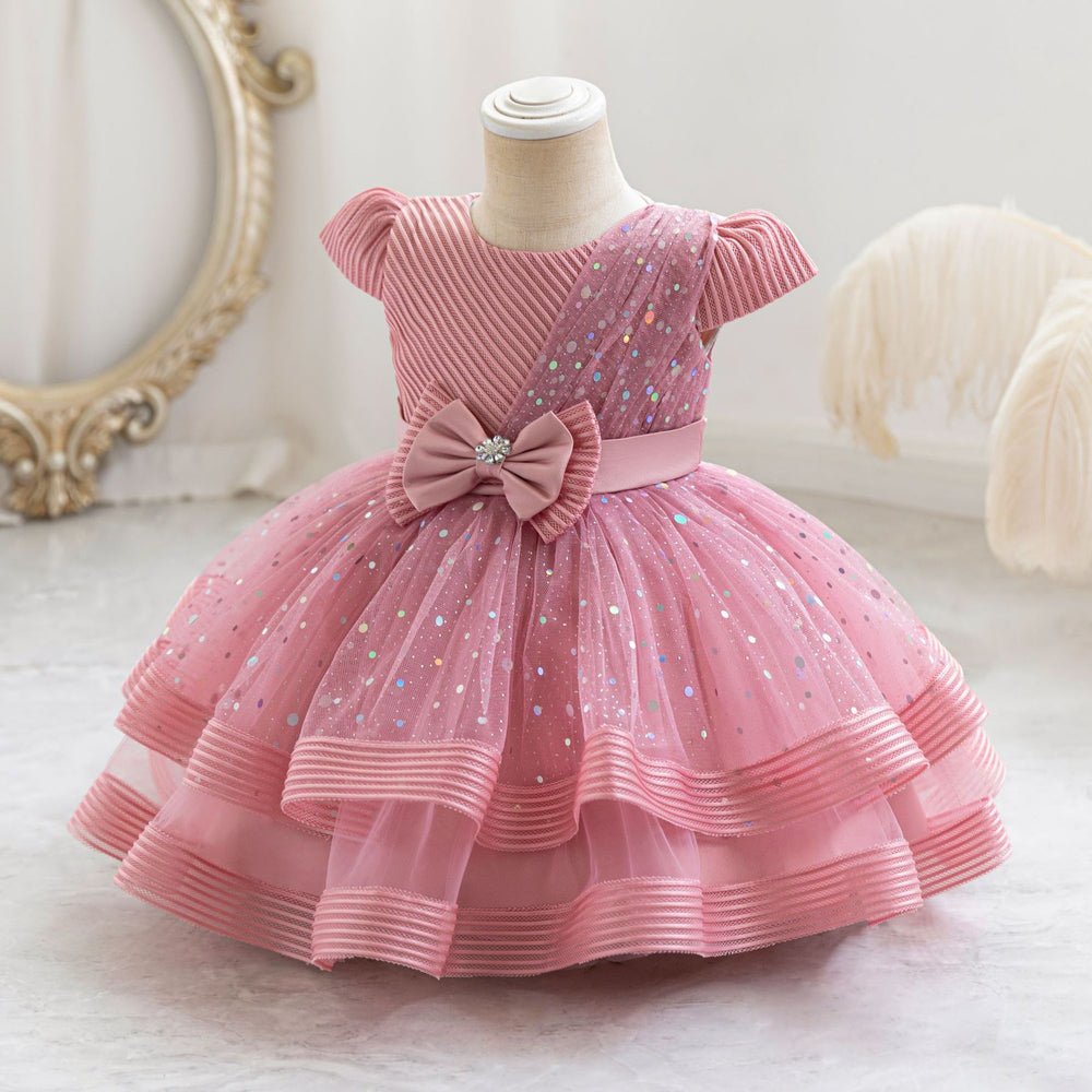 Ready-to-ship wholesale sequin bow princess dresses for girls, perfect for baby's first birthday or special occasions