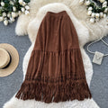 Korean style high-waisted a-line midi skirt with tassel detail - versatile work skirt for autumn