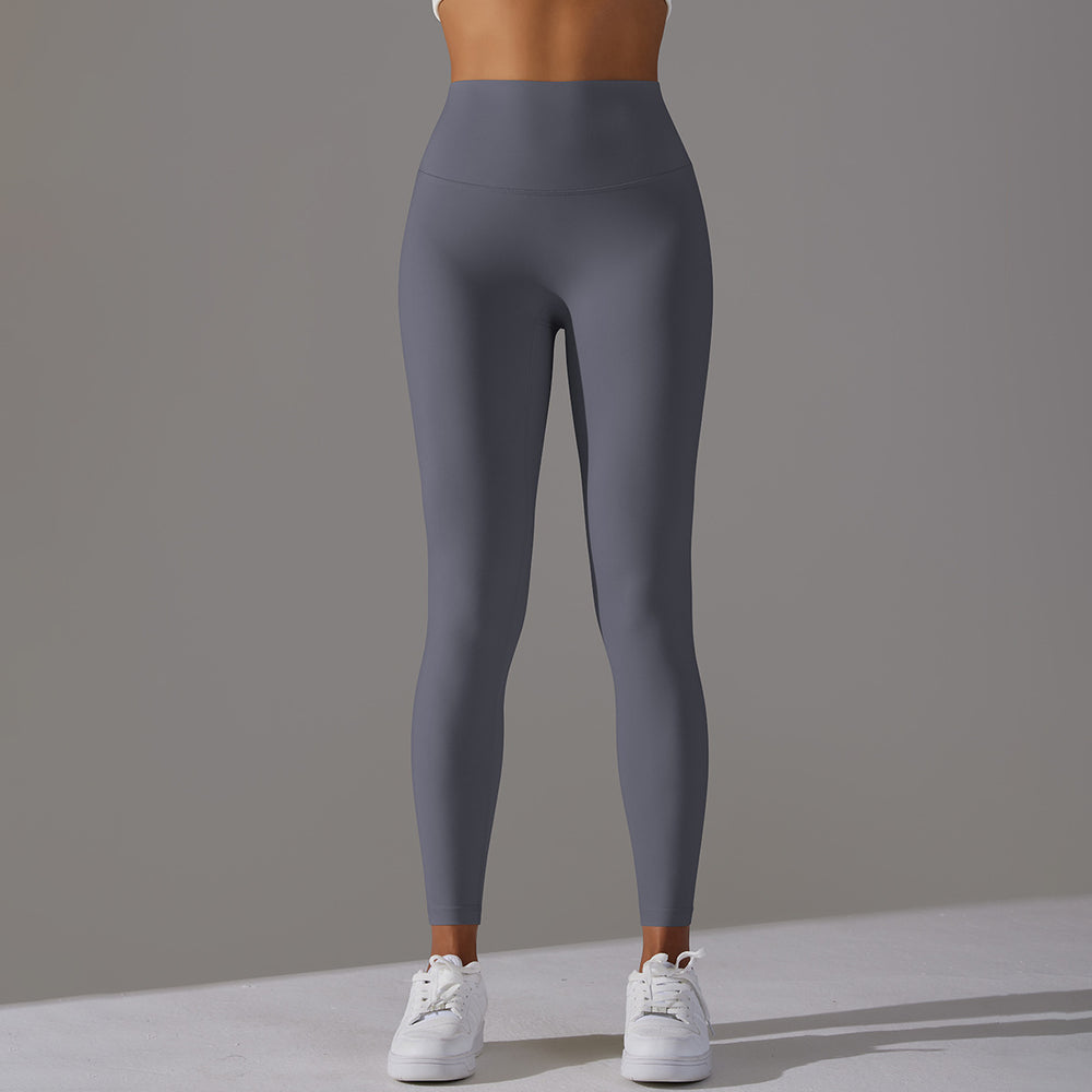 High-waisted, barely-there yoga pants for women, designed with a no-ride-up waistband for a seamless look. these figure-hugging, peach-shaped leggings offer a lift and a comfortable, stretchy fit, perfect for workouts and fitness activities. custom manufa