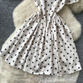 French chic polka dot dress - effortless summer style: square neck, cinched waist, slimming a-line for petite figures