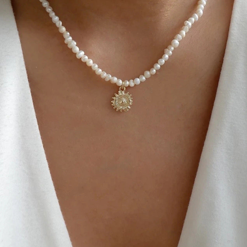 Pearl necklace wholesale fashion cross-border pendant jewelry alloy sun niche light luxury high-end sweater necklace for women