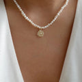 Pearl necklace wholesale fashion cross-border pendant jewelry alloy sun niche light luxury high-end sweater necklace for women