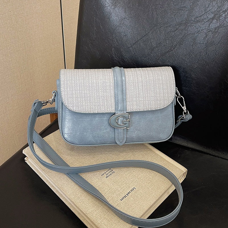 Fashion bag women's new Korean version of casual commuting simple shoulder bag high sense versatile foreign style portable messenger bag