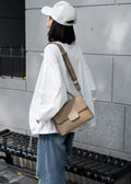 Top-grain leather women's shoulder bag, crossbody bag, minimalist and stylish. classic shell bag design for women, featuring two shoulder straps, large capacity, and soft leather