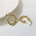 European and american style new twist rope circle minimalist titanium steel 18k gold plated niche geometric earrings for women wholesale