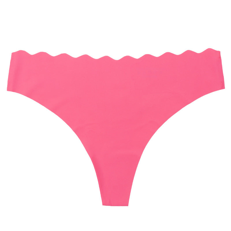 European and american  low-waist seamless ice silk underwear one-piece adhesive pure color cut out wavy waist women's underwear