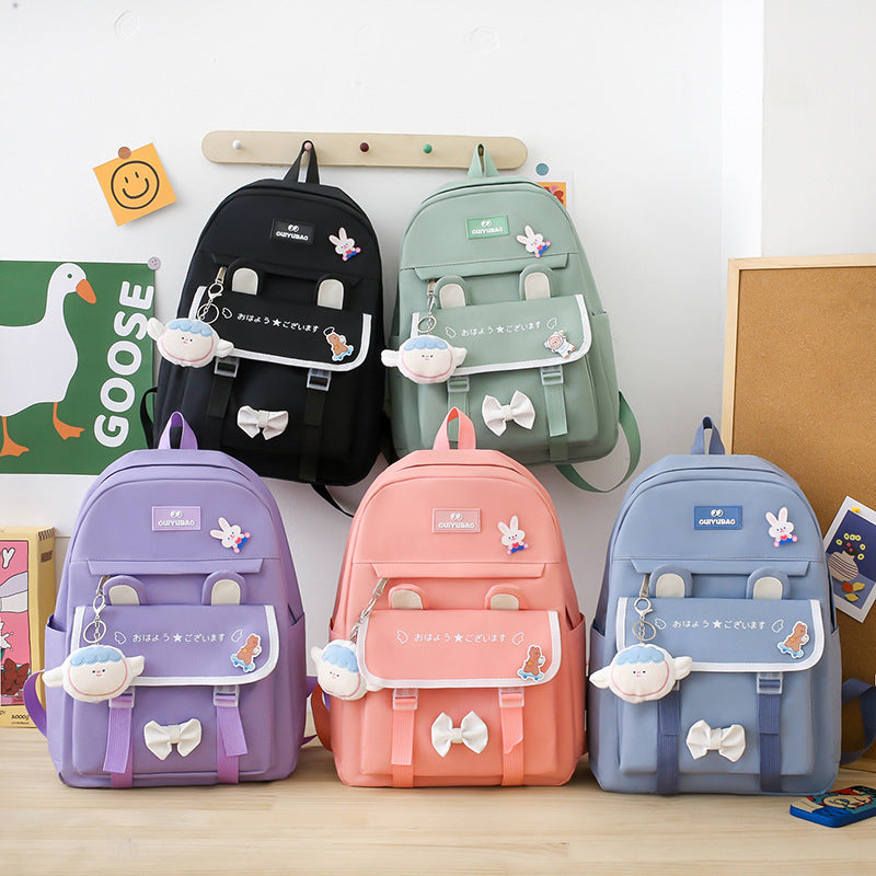 New primary and secondary school schoolbag cute male backpack Korean version backpack female cartoon schoolbag large capacity backpack