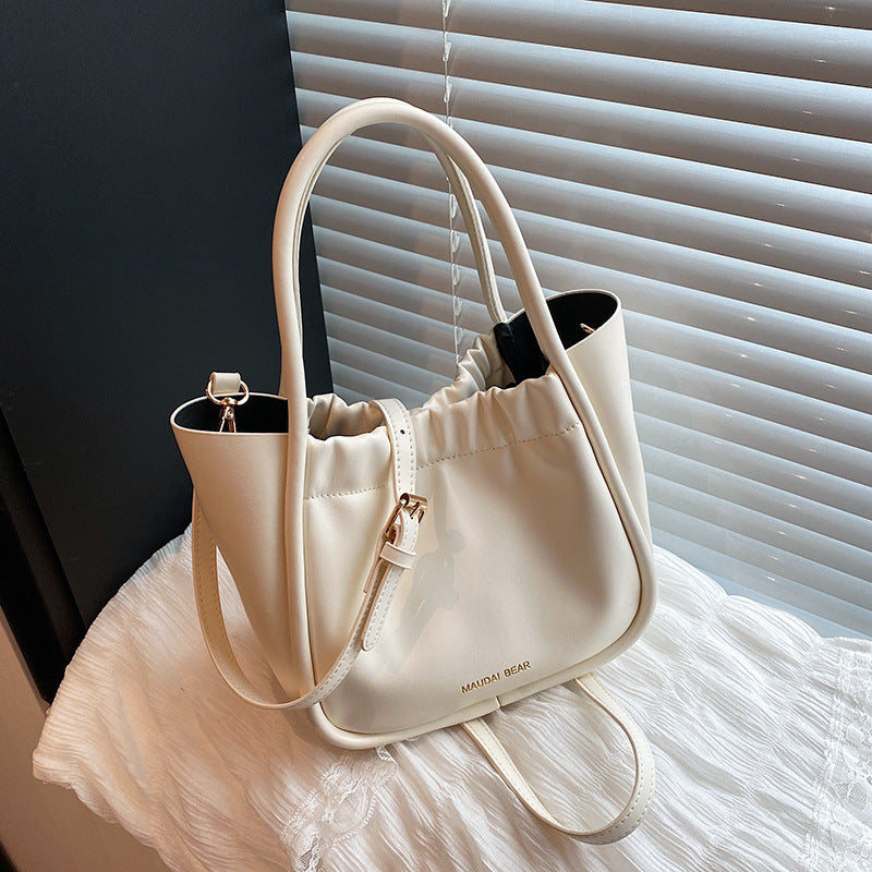 Foreign order high-quality texture foreign gas bucket bag women's 2025 summer new fashion commuter shoulder portable messenger bag