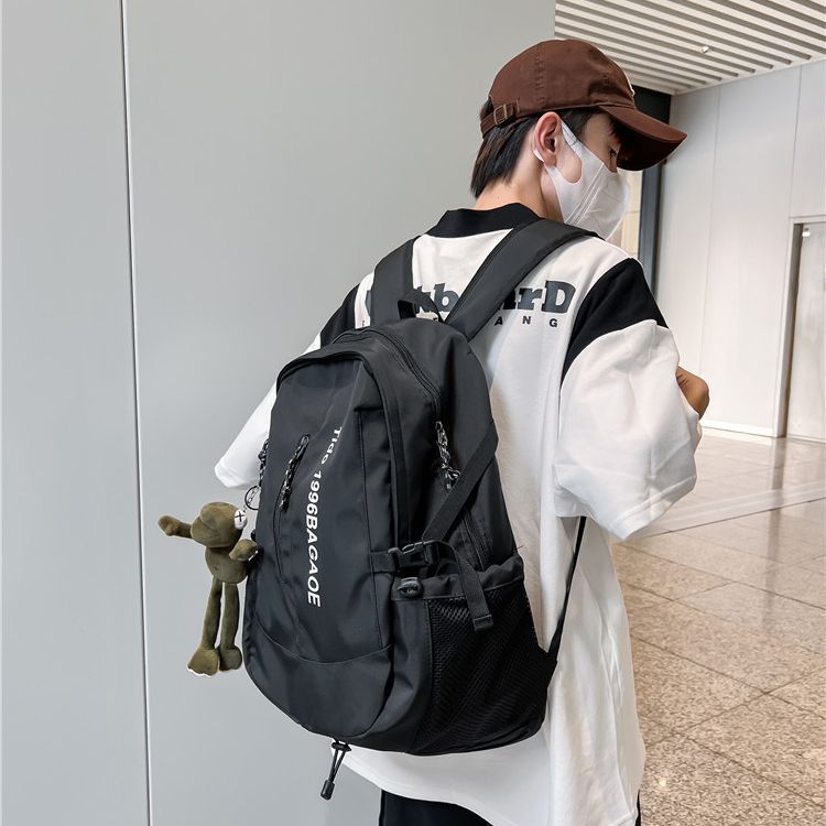 School bag male large capacity junior high school student middle school student fashion trend simple backpack female style travel bag