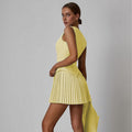 European and american cross-border  fashion two-piece set: women's v-neck single-breasted vest top and pleated mini skirt