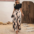 Amazon fashion cross-border women's black puff sleeve cropped top + botanical print wide-leg pant set