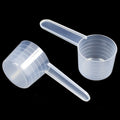 Mask plastic measuring spoon 60ml milliliters plastic feed fertilizer pesticide laundry detergent powder measuring spoon filled with water 60g grams