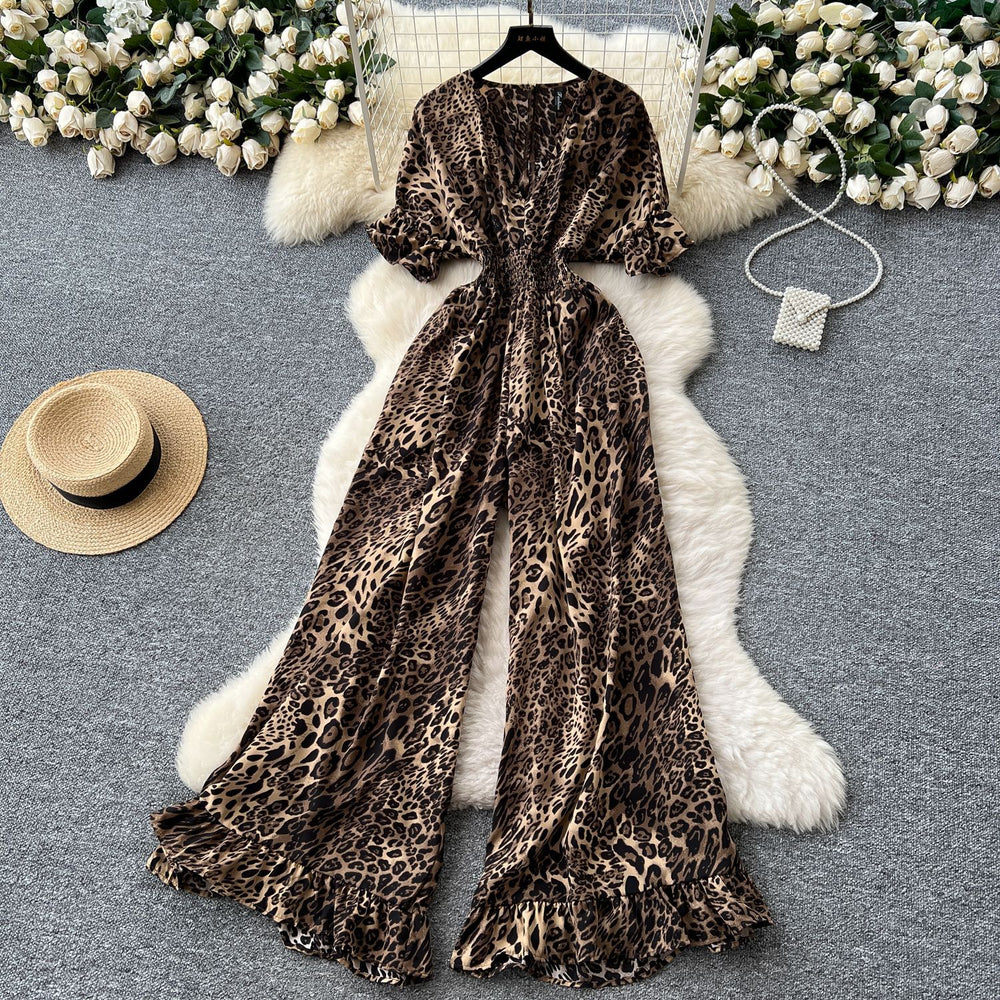 Summer vacation chic: effortless & mature casual v-neck short sleeve jumpsuit with elastic waist, high waist, slimming wide leg, and printed design