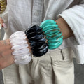 Bracelet women's wholesale european and american cross-border special-shaped splicing elastic resin bracelet niche high-end sense of smudged exaggerated hand jewelry
