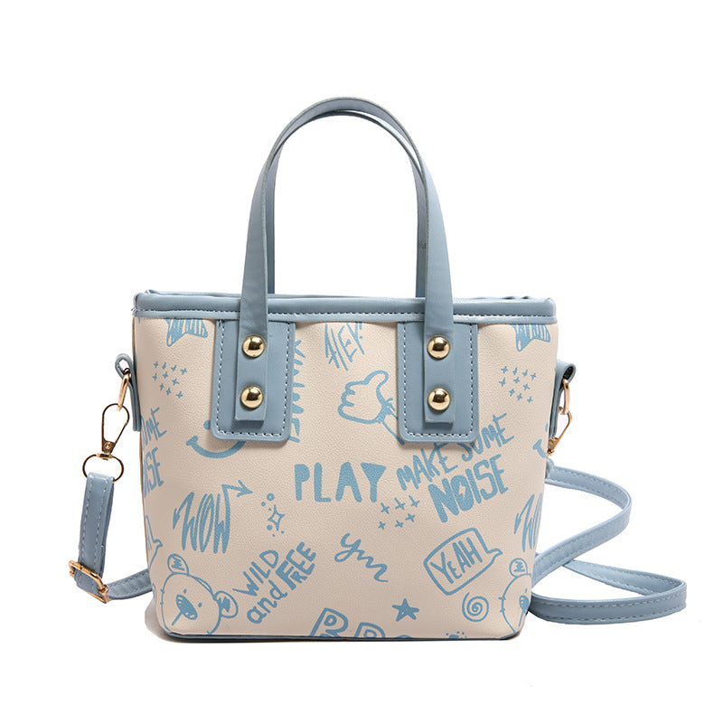 Cute cartoon printed bucket bag women 2025 new messenger bag women ins personality graffiti shoulder bucket bag