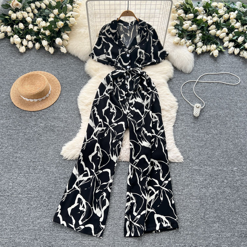Summer outfit: women's vacation-ready fashion - collared short sleeve tie-waist casual printed wide-leg jumpsuit/pants