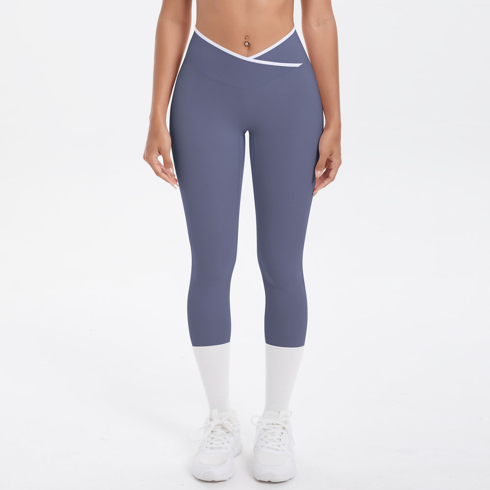 Naked-feel, figure-hugging, high-waisted yoga pants with a contrasting color block design. perfect for outdoor leisure, running, and quick-drying fitness workouts