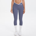 Naked-feel, figure-hugging, high-waisted yoga pants with a contrasting color block design. perfect for outdoor leisure, running, and quick-drying fitness workouts