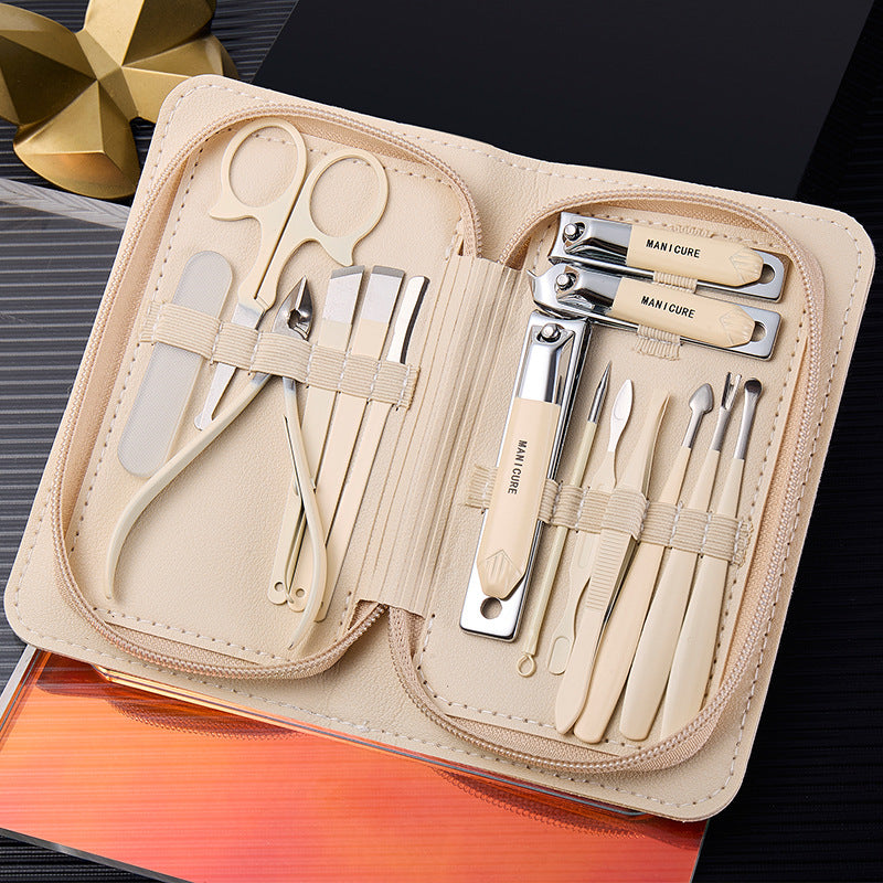 Stainless steel manicure & pedicure tool set - 9 piece kit: includes nail clippers, eyebrow scissors, earwax removal tool, and nail file - wholesale
