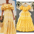 Elegant, sophisticated, and effortlessly chic: this ruffled, off-the-shoulder, lace-embroidered, and cutout maxi dress is perfect for a glamorous beach vacation