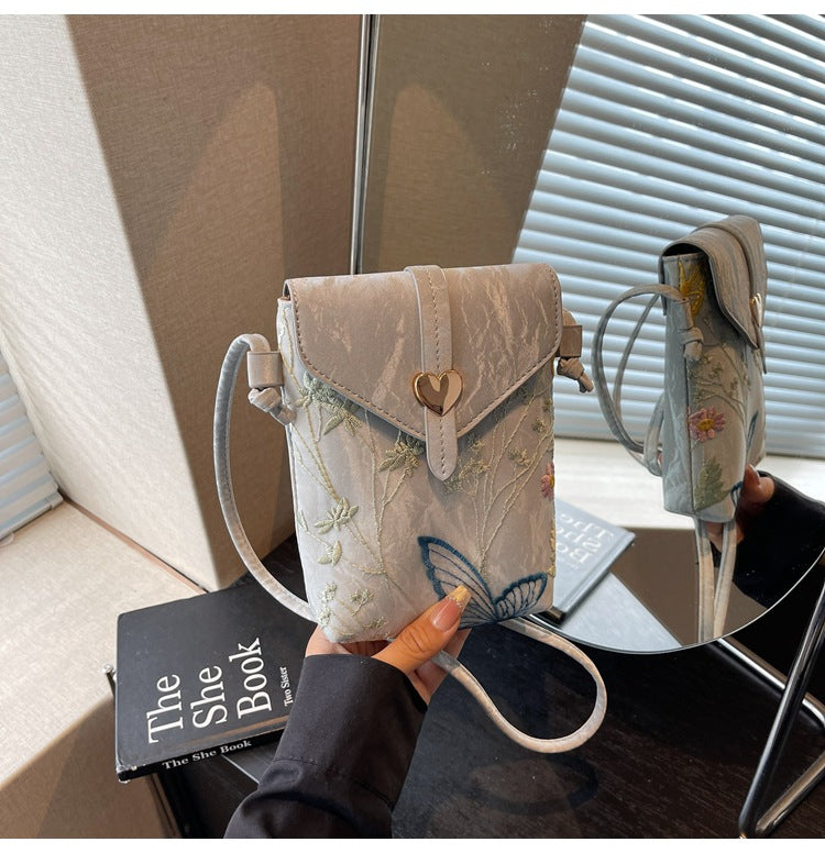 Cross-border embroidered canvas bag women's summer 2025 new fashion niche messenger bag Korean version Internet celebrity popular mobile phone bag