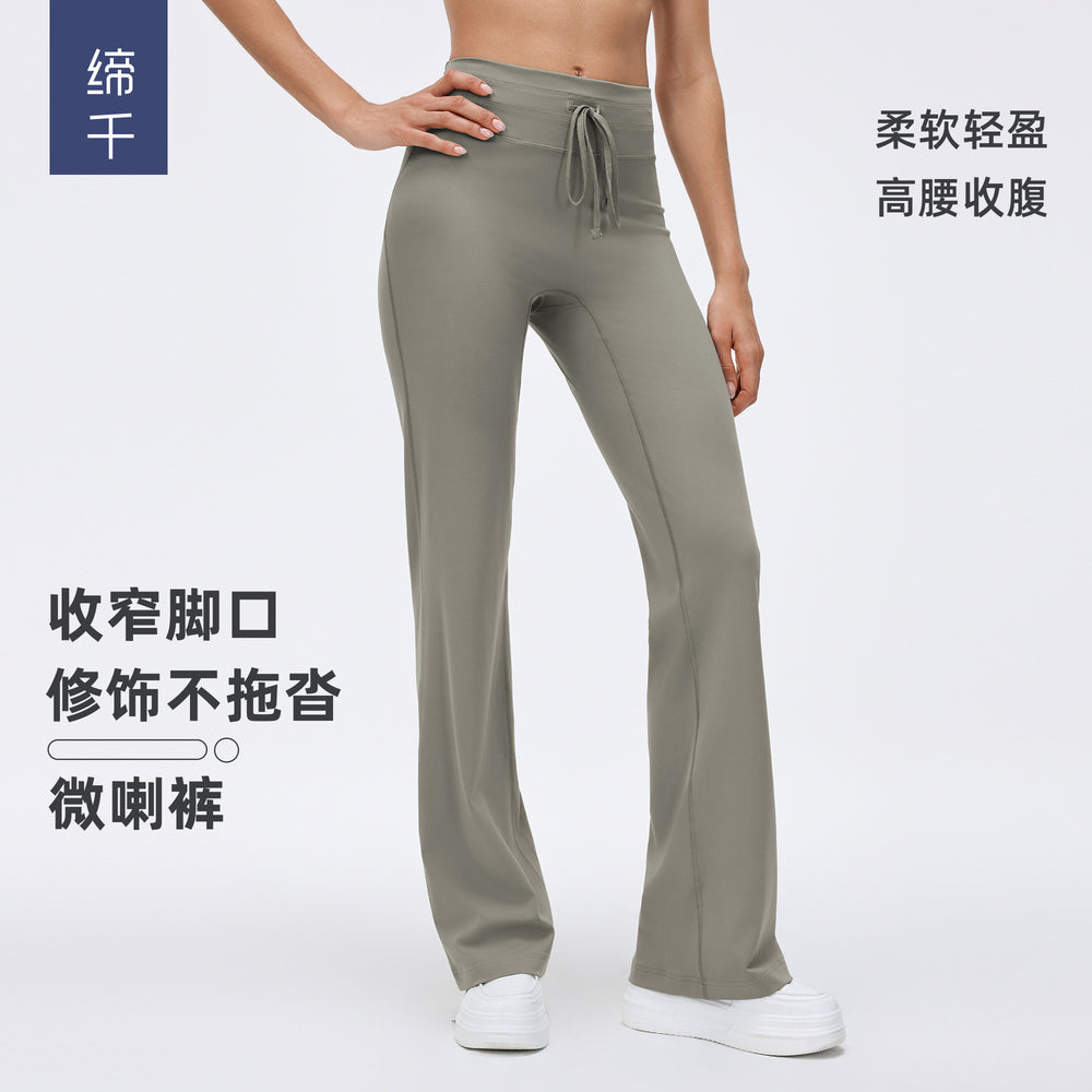 High-waisted, drawstring, flared yoga pants for women. high-stretch, breathable, suitable for wearing outdoors. professional pilates and fitness leggings. d26012