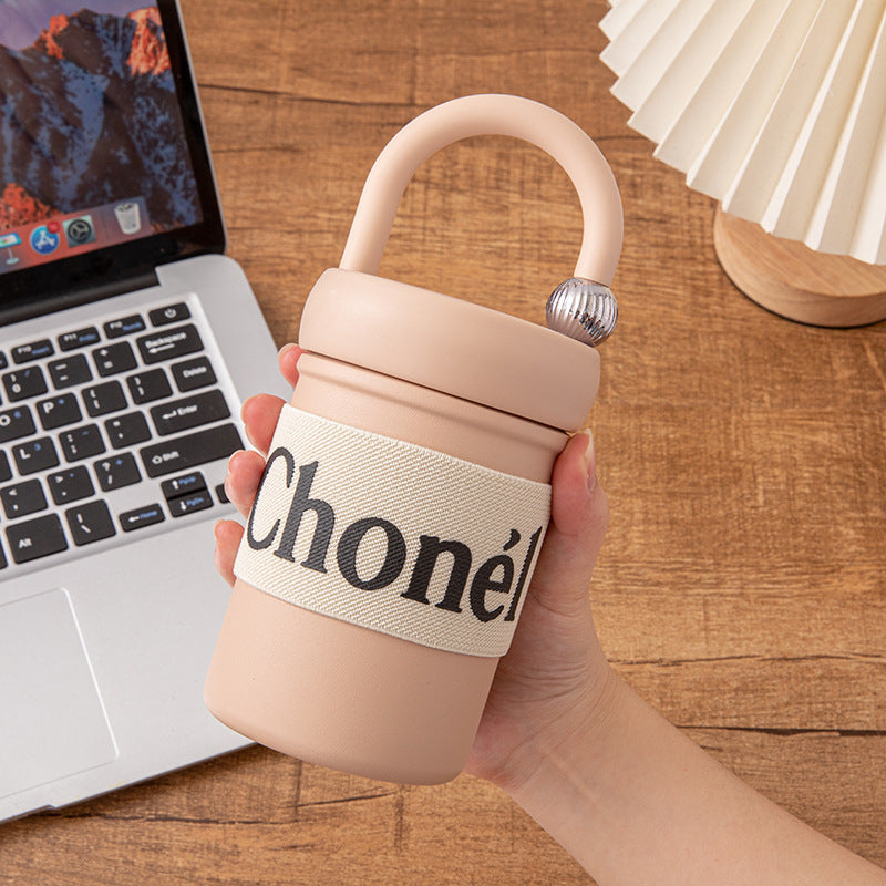 Here are a few options, depending on the specific nuance you want to convey:  **option 1 (focus on features):**  "women's compact & portable insulated tumbler: stylish 316 stainless steel water bottle, perfect for office coffee - cross-border exclusive"