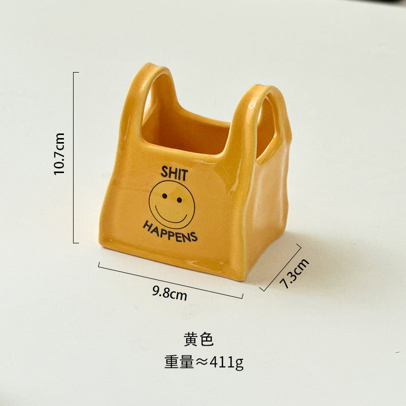 Personalized hand pinch bag desktop creative ceramic pen holder remote control stationery storage box makeup pen storage bucket small ornament