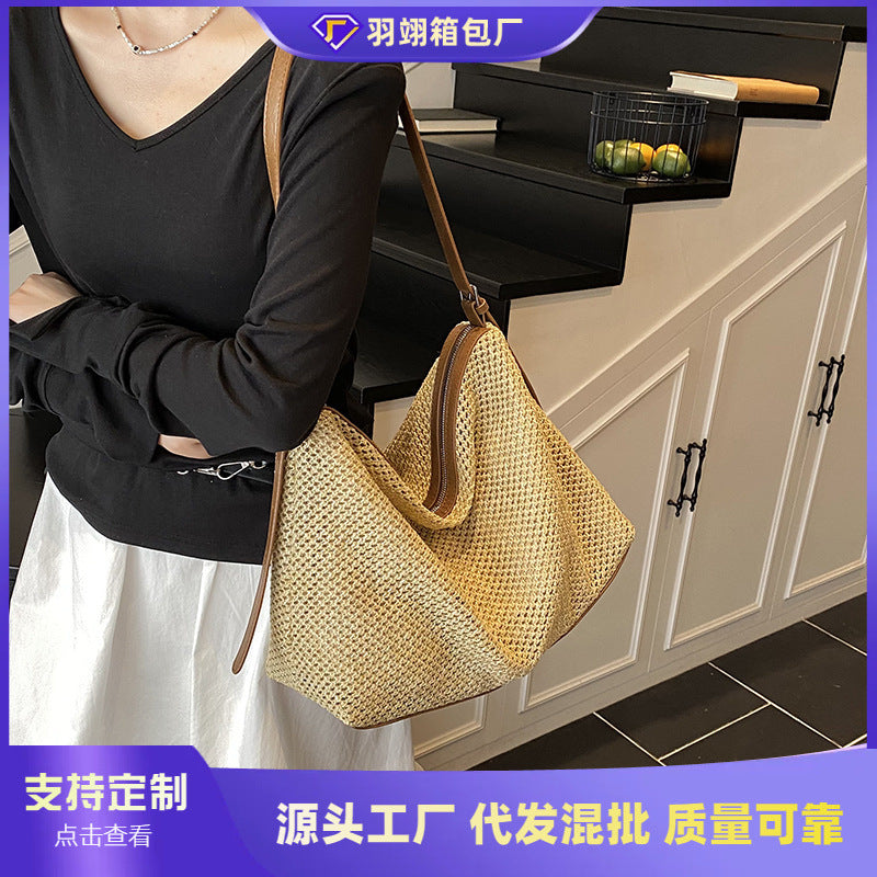 Foreign order large-capacity straw woven bag women's 2025 new summer versatile beach vacation woven tote bag messenger bag