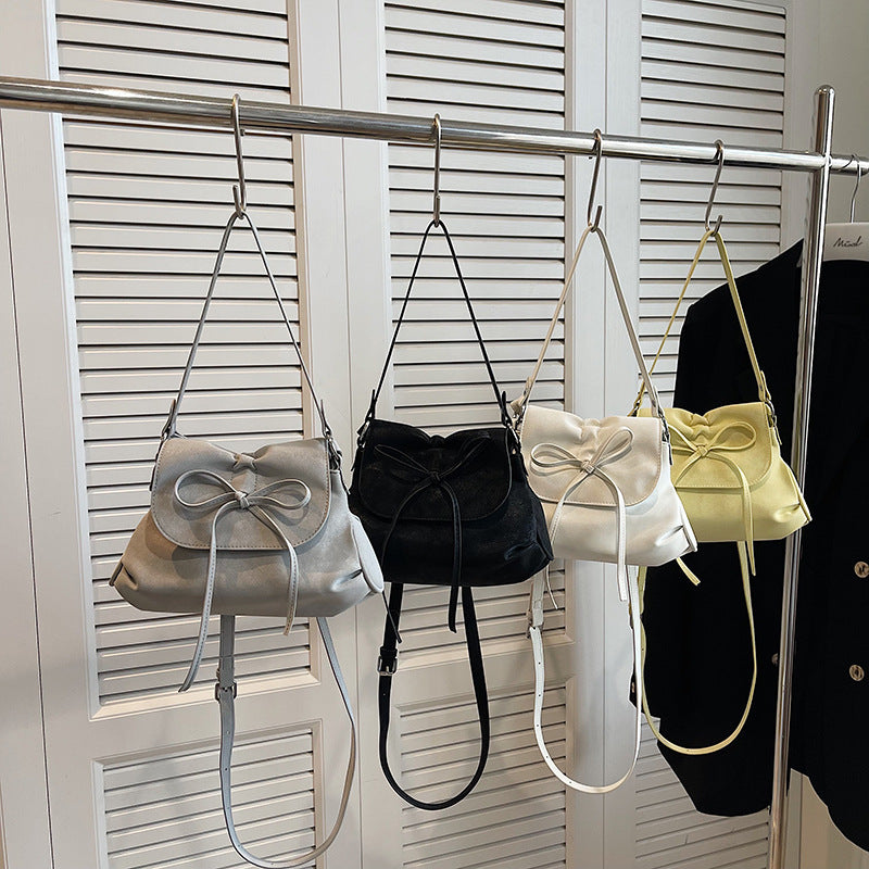 Solid color versatile bow small square bag women's bag 2025 new fashion simple shoulder bag foreign style portable commuter bag