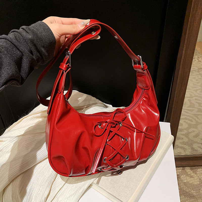 Cross-border fashion niche straps dumpling bag women's 2025 new popular versatile single shoulder messenger bag commuter armpit bag