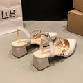 Rivet toe sandals for women with thick heels 2025 spring and summer new arrival studded roman fashion patent leather pointed toe beige wedge sandals