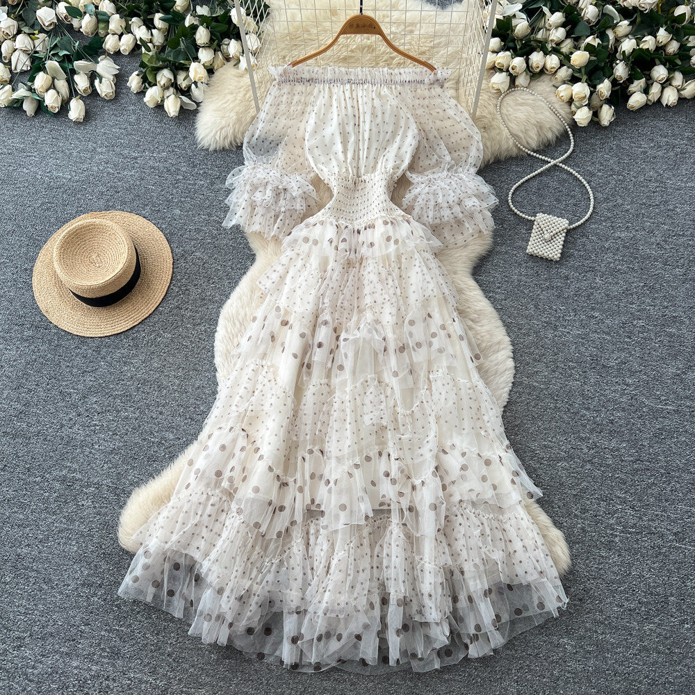 Sweet and lovely pink mesh dress for women, perfect for summer. features an off-the-shoulder design, puff sleeves, a high waist, and an a-line silhouette. an ethereal, fairy-tale style