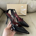 Spanish 2025 summer new arrivals: sexy hollow-out women's black patent leather ankle strap buckle pointed-toe stiletto mules