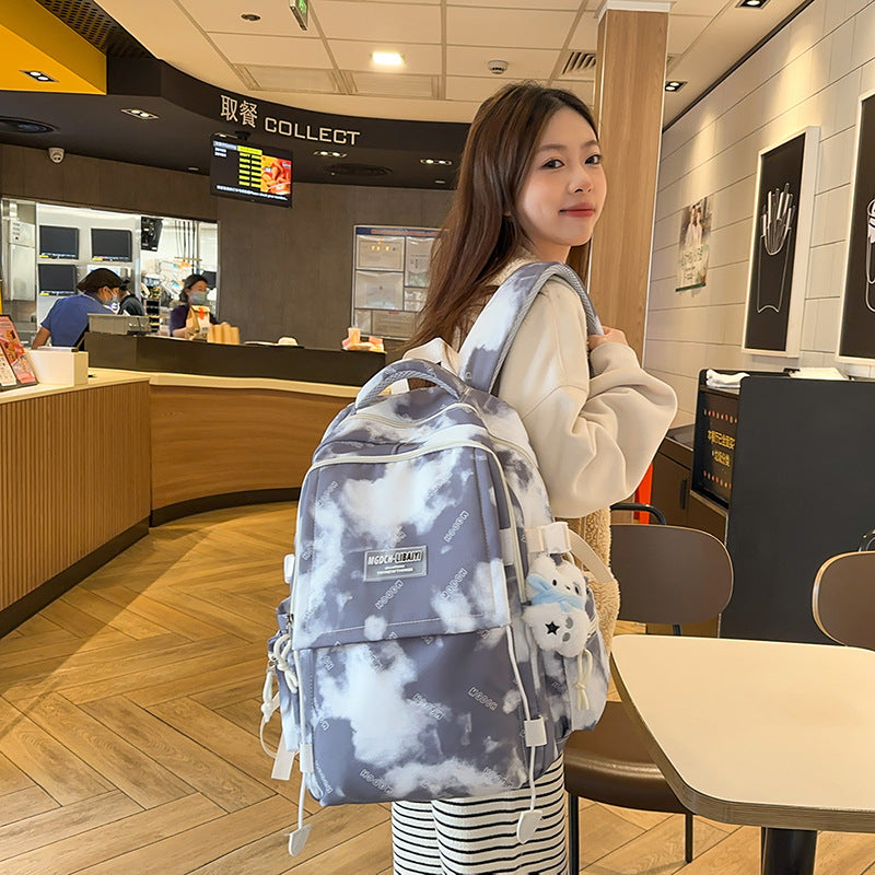 School bag, high-value niche design, tie-dye backpack, middle school student burden reduction, college student computer backpack, large capacity