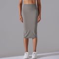 High-waisted, barely-there feel, figure-hugging bodycon skirt. casual, sporty midi skirt with high elasticity and skin-friendly fabric. features a slit and is perfect for yoga or everyday wear