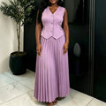 New solid color versatile set: high-waisted pleated slim-fit waist-cinching sleeveless drawstring top and a-line midi skirt two-piece outfit