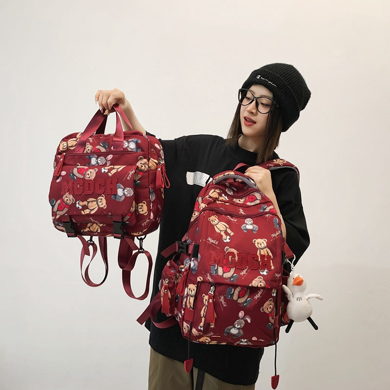 New schoolbag for female junior high school students, simple printed bear, large-capacity backpack, trendy college student couple computer bag