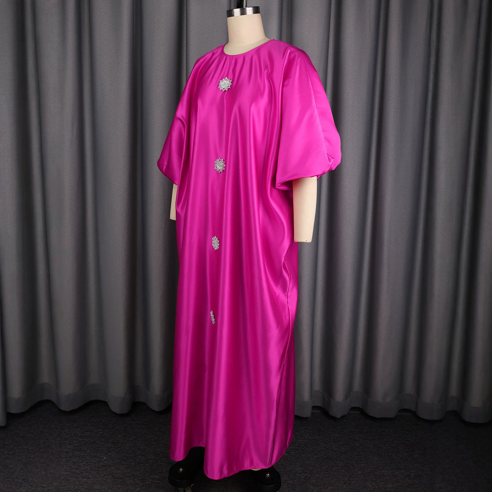 African-inspired loose fit lantern sleeve maxi dress - round neck, cinched waist, flowy hem, solid color party dress