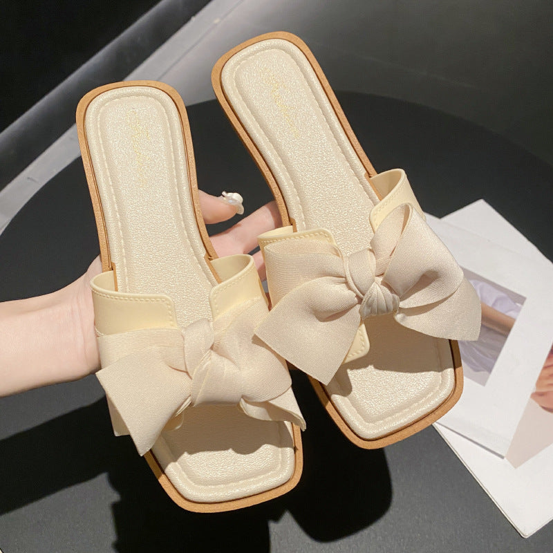 Influencer-approved, new square-toe, fairy-style bow sandals for women. perfect for summer wear, these wedge-heeled, fashionable, versatile, flat, and non-slip slides are a must-have