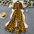 Summer vacation chic: effortless & mature casual v-neck short sleeve jumpsuit with elastic waist, high waist, slimming wide leg, and printed design