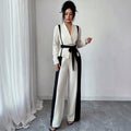 minimalist color block two-piece set: v-neck, tie-waist jacket with black and white wide-leg pants