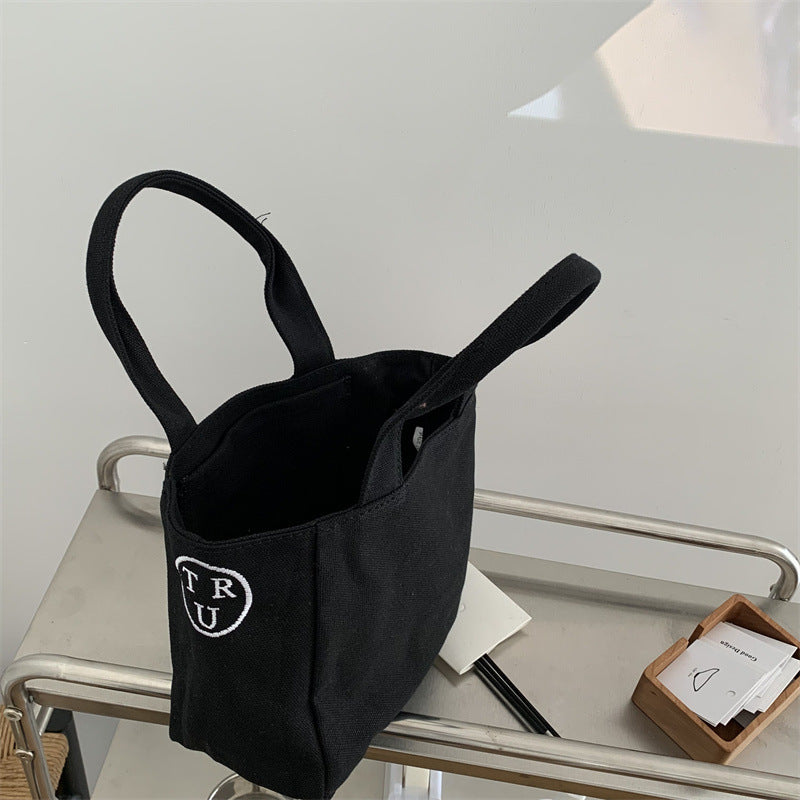 New bag female Korean generation with the same letter printed canvas handbag bento bag simple casual light tote bag