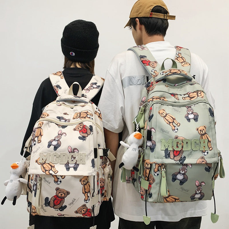 New schoolbag for female junior high school students, simple printed bear, large-capacity backpack, trendy college student couple computer bag