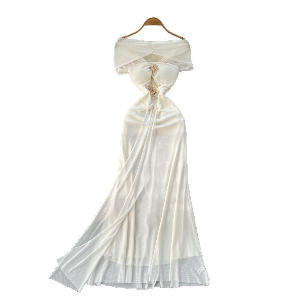 Luxury chic women's french-style one-shoulder bandeau dress with metal buckle, cinched waist, and flowing ribbon mesh detail