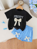 summer girls' outfit: round neck letter print top with sky blue shorts and bow detail - kids' two-piece set